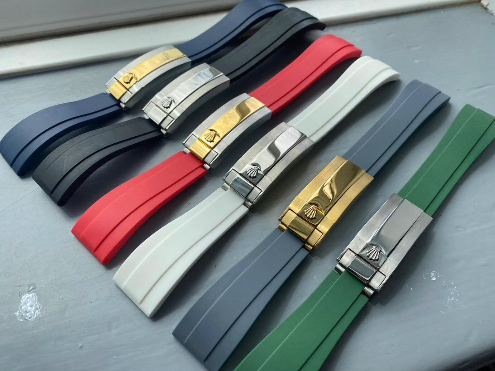 Looking for a Jubilee & an Oyster flex(Rubber) Bracelet kind of a strap for  this one with Buckle, Please can anyone suggest me options which  aftermarket brand would be an ideal fit?